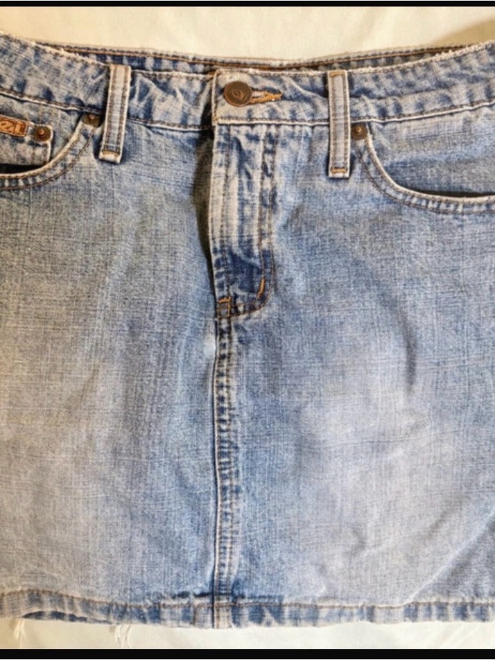 Cute distressed denim mini skirt